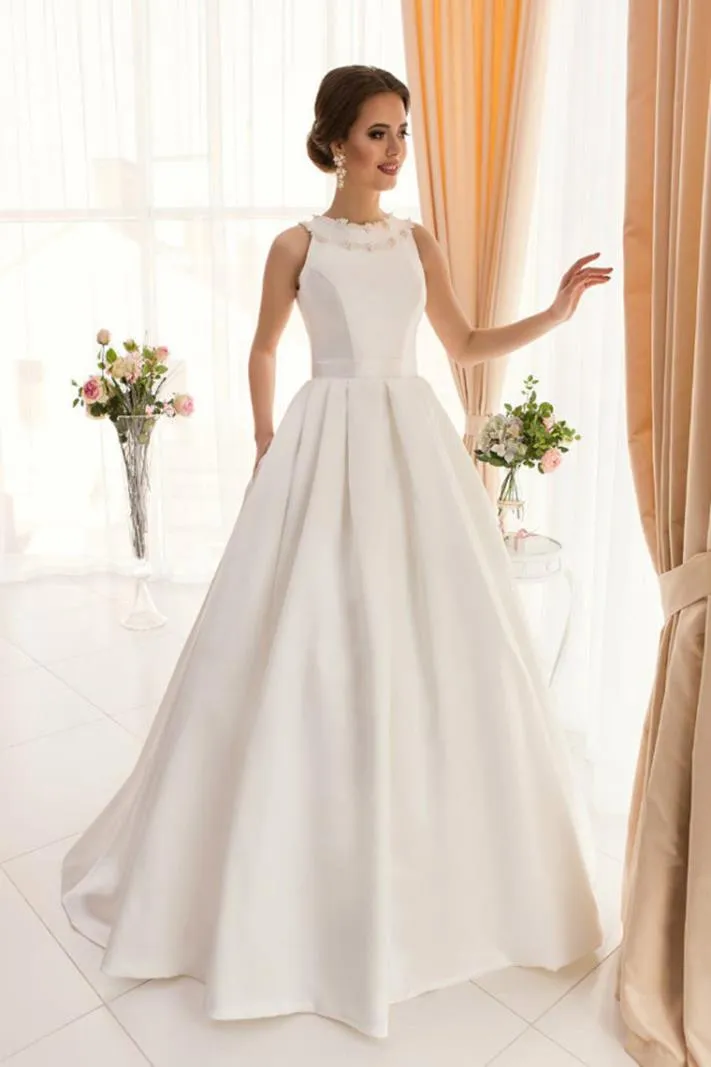 ---Classic style A line duchess satin wedding dress with wide, pleated skirt featuring a small train, stiff bodice with padded c