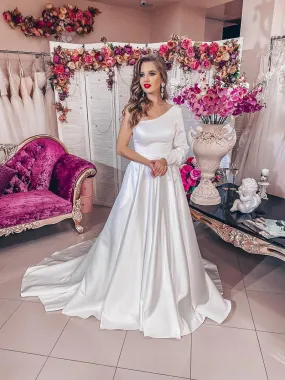 ---Mikado wedding dress one-shoulder with long puff sleeves and long A-line skirt with a beautiful chapel length train--