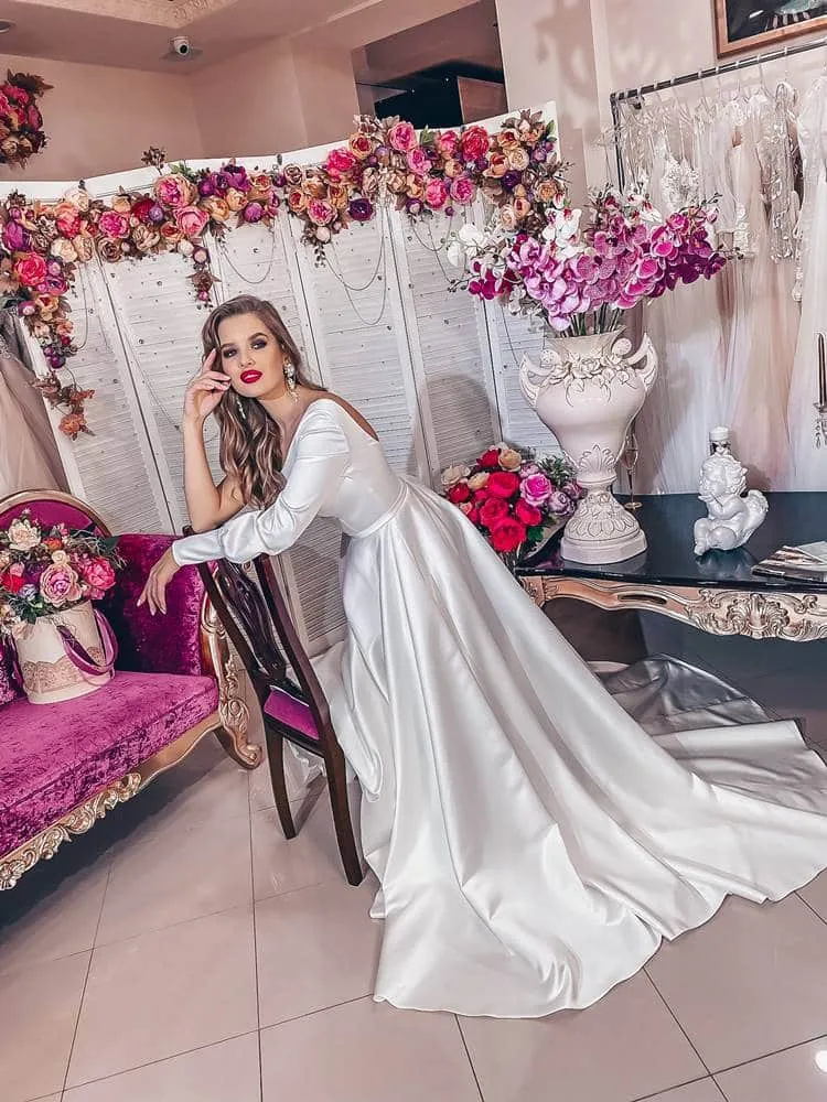 ---Mikado wedding dress one-shoulder with long puff sleeves and long A-line skirt with a beautiful chapel length train--