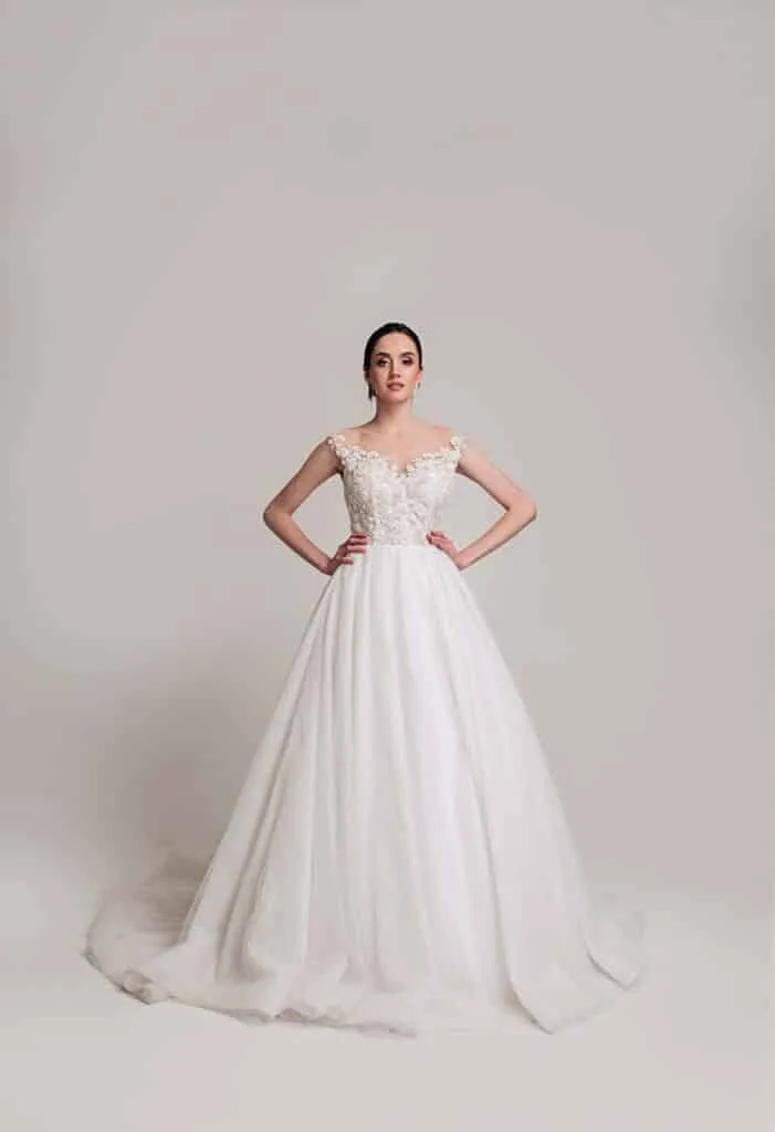 ---Wonderful white wedding dress with three-dimensional lace embroidery on the bodice and straps that are a dream--