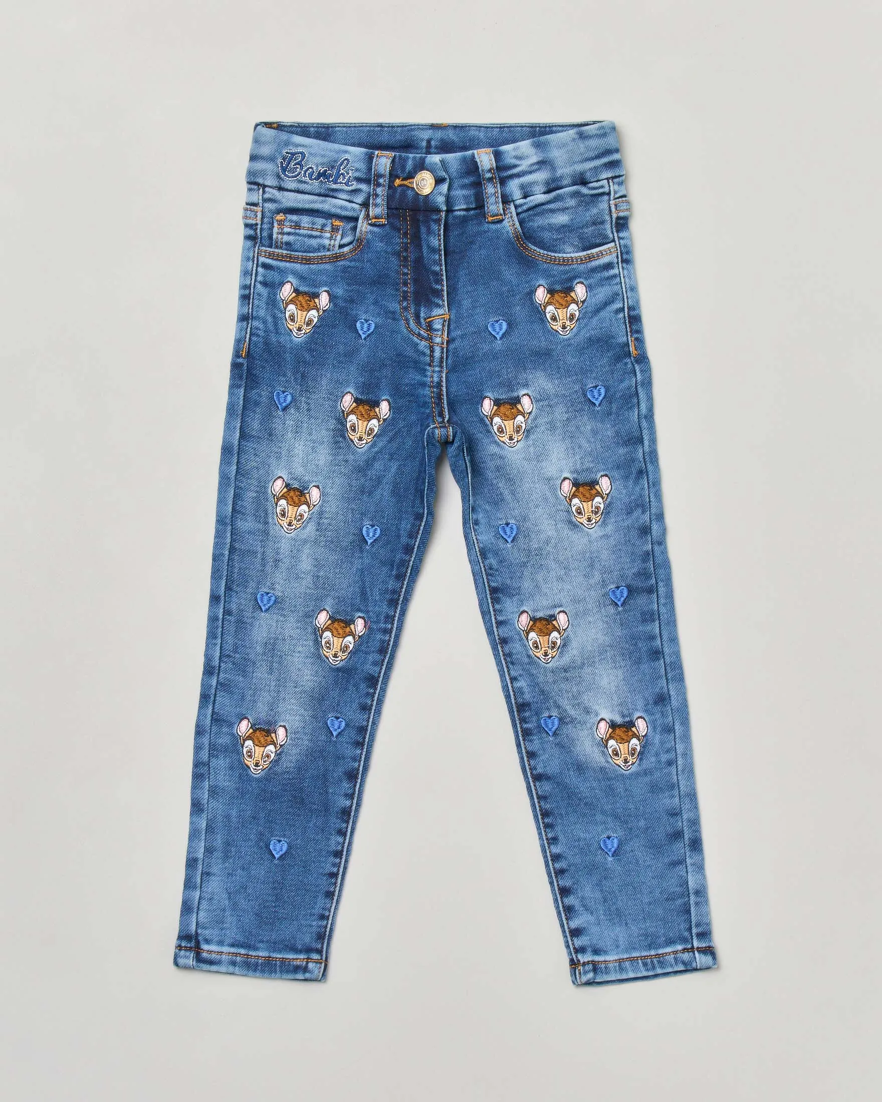 Jeans in denim di cotone stretch stone washed con patch cuori e bambi ricamati 2-8 anni