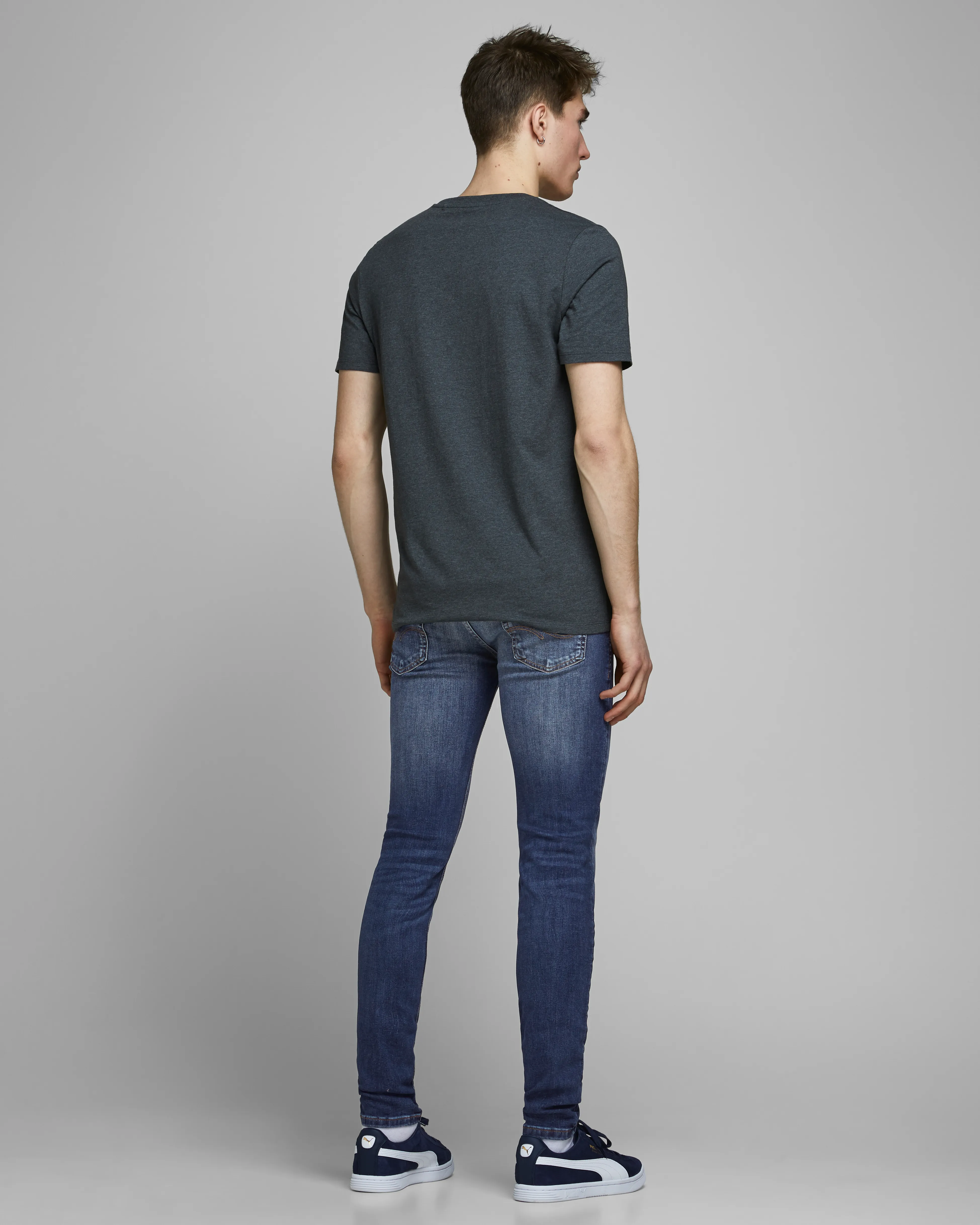 Jeans Liam skinny fit a vita bassa lavaggio medio super stone washed con baffature