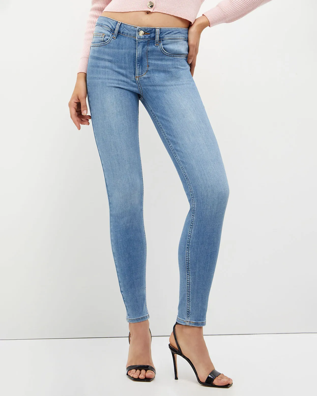 Jeans skinny bottom up a vita alta in cotone strech lavaggio chiaro super stone washed